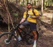 He rides a bike and workout to keep himself fit.